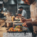 "Professional chef in a white apron carefully plating a gourmet Soutaipasu fish dish in a modern restaurant kitchen.